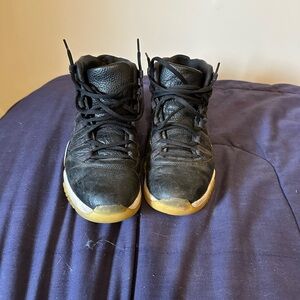 Jordan Black and Gold High-Top Sneakers